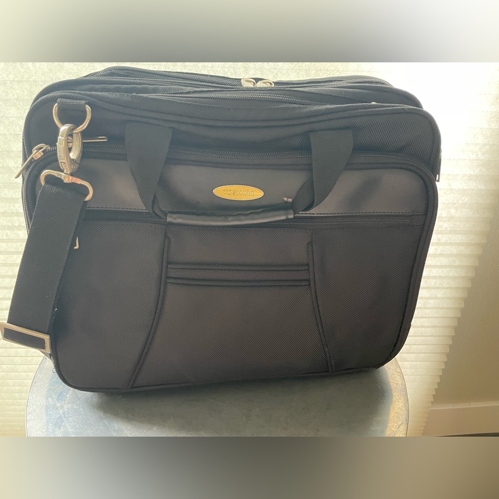 Toshiba Laptop Messenger bag, Black, Canvas, Black strap with Silver Handles.